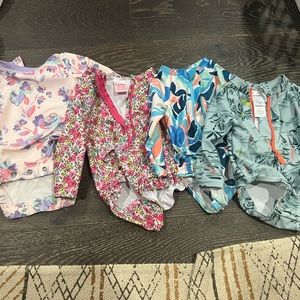 Four 3 month baby girl bathing suits